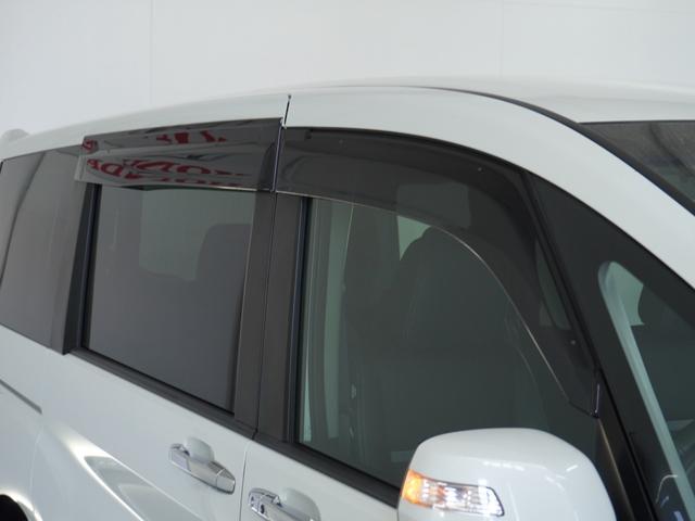 ステップワゴンスパーダ スパーダハイブリッドG・EXホンダセンシング 〇ナビ 後席モニタ 全周囲カメ ETC2.0 両電扉 BT 地デジ ドアバイザー わくわくゲート 三列シート 後席シェード シートヒーター 合皮コンビシート ウインカーミラー インテリア内装ブラック(34枚目)