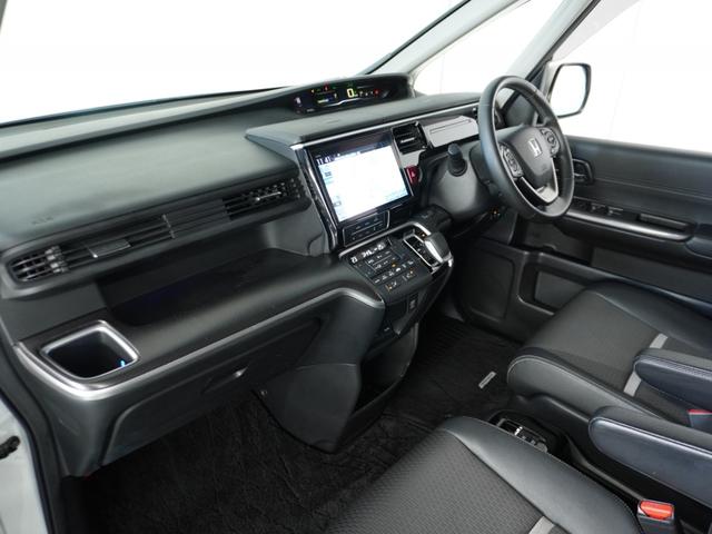 ステップワゴンスパーダ スパーダハイブリッドG・EXホンダセンシング 〇ナビ 後席モニタ 全周囲カメ ETC2.0 両電扉 BT 地デジ ドアバイザー わくわくゲート 三列シート 後席シェード シートヒーター 合皮コンビシート ウインカーミラー インテリア内装ブラック(39枚目)