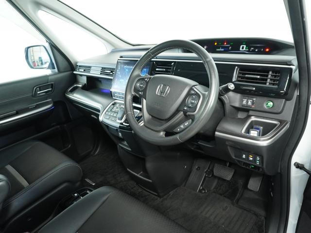 ステップワゴンスパーダ スパーダハイブリッドG・EXホンダセンシング 〇ナビ 後席モニタ 全周囲カメ ETC2.0 両電扉 BT 地デジ ドアバイザー わくわくゲート 三列シート 後席シェード シートヒーター 合皮コンビシート ウインカーミラー インテリア内装ブラック(72枚目)