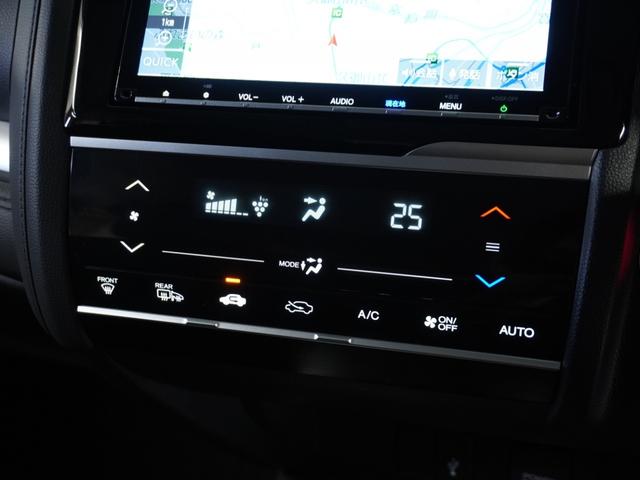 フィットハイブリッド Ｌホンダセンシング　１オ－ナ－　ナビ　Ｒカメ　Ｄレコ　ＥＴＣ　クルコン　ＢＴ　地デジ　サイドバイザー　合皮コンビシート　インテリア内装ブラック　サイドバイザー　モデューロアルミホイル　フロントグラデーションガラス（10枚目）