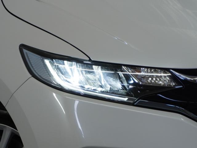 フィットハイブリッド Ｌホンダセンシング　１オ－ナ－　ナビ　Ｒカメ　Ｄレコ　ＥＴＣ　クルコン　ＢＴ　地デジ　サイドバイザー　合皮コンビシート　インテリア内装ブラック　サイドバイザー　モデューロアルミホイル　フロントグラデーションガラス（14枚目）