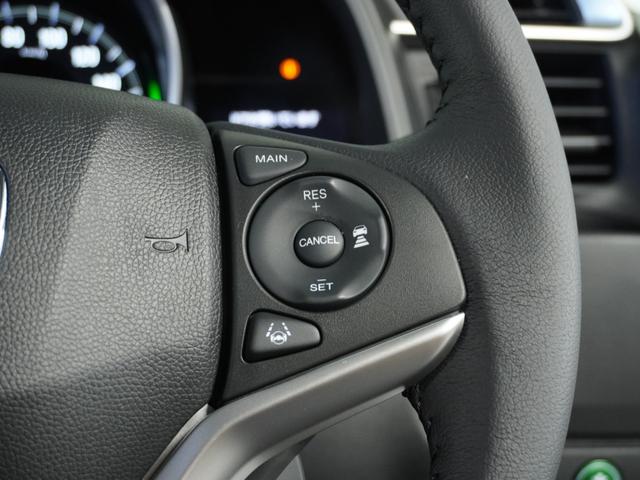 フィットハイブリッド Ｌホンダセンシング　１オ－ナ－　ナビ　Ｒカメ　Ｄレコ　ＥＴＣ　クルコン　ＢＴ　地デジ　サイドバイザー　合皮コンビシート　インテリア内装ブラック　サイドバイザー　モデューロアルミホイル　フロントグラデーションガラス（21枚目）