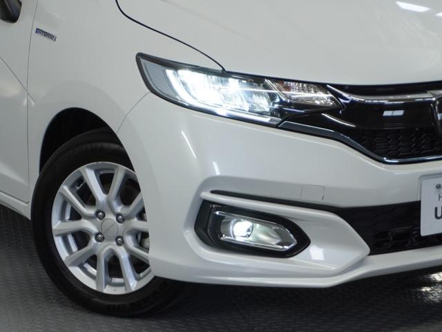 フィットハイブリッド Ｌホンダセンシング　１オ－ナ－　ナビ　Ｒカメ　Ｄレコ　ＥＴＣ　クルコン　ＢＴ　地デジ　サイドバイザー　合皮コンビシート　インテリア内装ブラック　サイドバイザー　モデューロアルミホイル　フロントグラデーションガラス（32枚目）