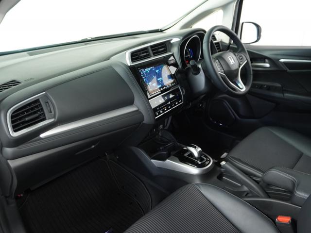 フィットハイブリッド Ｌホンダセンシング　１オ－ナ－　ナビ　Ｒカメ　Ｄレコ　ＥＴＣ　クルコン　ＢＴ　地デジ　サイドバイザー　合皮コンビシート　インテリア内装ブラック　サイドバイザー　モデューロアルミホイル　フロントグラデーションガラス（35枚目）