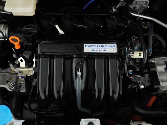 フィットハイブリッド Ｌホンダセンシング　１オ－ナ－　ナビ　Ｒカメ　Ｄレコ　ＥＴＣ　クルコン　ＢＴ　地デジ　サイドバイザー　合皮コンビシート　インテリア内装ブラック　サイドバイザー　モデューロアルミホイル　フロントグラデーションガラス（64枚目）