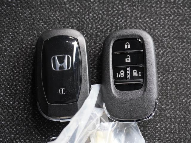 Ｎ－ＢＯＸカスタム ベースグレード　デモカー　９インチ純正ナビ　ドラレコ　ＥＴＣ　バックカメラ　両側電動スライドドア　渋滞追従クルーズ　　Ｂｌｕｅｔｏｏｔｈ　障害物センサー　シートヒーター　デイライト　オートライト　禁煙車　スペアキー有（19枚目）