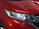 Ｇ・ホンダセンシング　１オ－ナ－　ナビ　Ｒカメ　ＥＴＣ　両電扉　ＢＴ　地デジ　ＬＥＤ　後席シェード　マッドガード　インテリア内装ブラック　合皮コンビシート　サイドバイザー　二列目キャプテンシート　革巻ステアリング（13枚目）