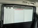 スパーダハイブリッドG・EXホンダセンシング 〇ナビ 後席モニタ 全周囲カメ ETC2.0 両電扉 BT 地デジ ドアバイザー わくわくゲート 三列シート 後席シェード シートヒーター 合皮コンビシート ウインカーミラー インテリア内装ブラック(25枚目)