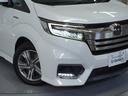 スパーダハイブリッドG・EXホンダセンシング 〇ナビ 後席モニタ 全周囲カメ ETC2.0 両電扉 BT 地デジ ドアバイザー わくわくゲート 三列シート 後席シェード シートヒーター 合皮コンビシート ウインカーミラー インテリア内装ブラック(35枚目)