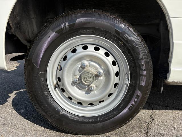 Ｎ－ＶＡＮ Ｇ・ホンダセンシング　ＣＶＴ　４ＷＤ　衝突軽減ブレーキ　横滑り防止　社外ナビ　Ｂｌｕｅｔｏｏｔｈ接続可　ラジオ　バックカメラ　ＥＴＣ　オートエアコン　前席パワーウィンドウ　純正キーレス（14枚目）