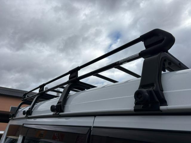 スクラム バスター　４ＡＴ　衝突軽減ブレーキ　横滑り防止　パーキングアシスト　社外ナビ　Ｂｌｕｅｔｏｏｔｈ接続　ラジオ　バックカメラ　ＥＴＣ　マニュアルエアコン　パワーウィンドウ　電格ミラー　純正キーレス（21枚目）