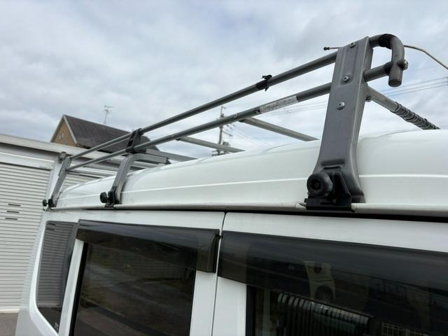 エブリイ ＰＣ　４ＡＴ　衝突軽減ブレーキ　横滑り防止　パーキングアシスト　社外ナビ　ラジオ　ＡＵＸ　マニュアルエアコン　前席パワーウィンドウ　純正キーレス（21枚目）