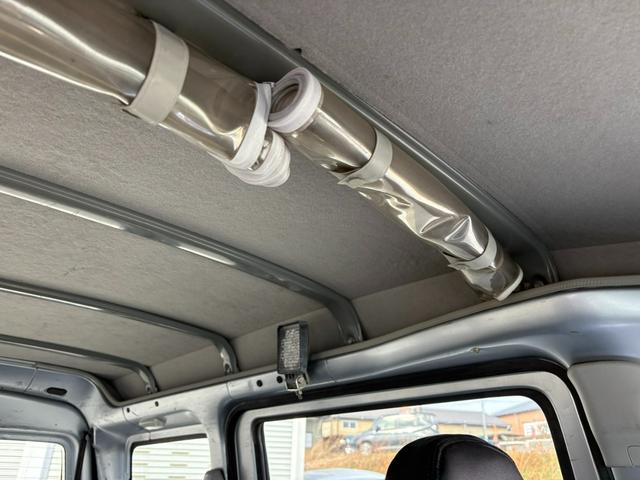 ハイゼットカーゴ ＤＸ　ＳＡＩＩＩ　４ＡＴ　衝突軽減ブレーキ　横滑り防止　アイドリングストップ　新品シートカバー付き　バックカメラ　マニュアルエアコン　前席パワーウィンドウ　純正キーレス（37枚目）