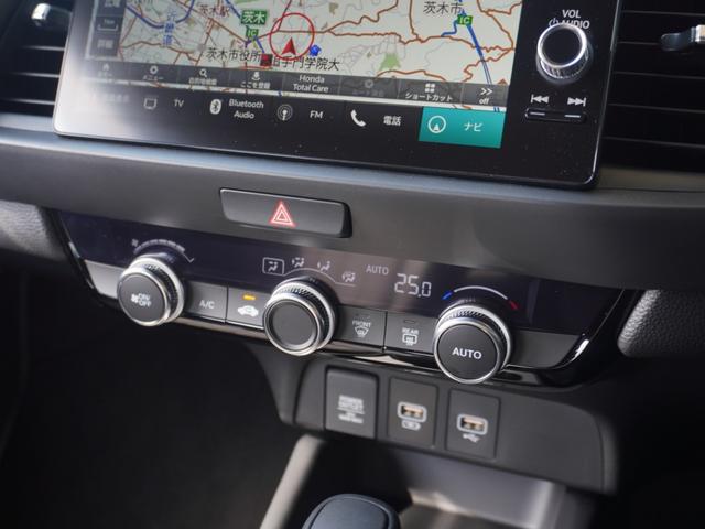 フィット ｅ：ＨＥＶホーム　ワンオーナー　９インチナビ　バックカメラ　ドラレコ　ＥＴＣ２．０　渋滞追従クルーズ　Ｂｌｕｅｔｏｏｔｈ　ＵＳＢ入力端子　デイライト　障害物センサー　オートハイビーム　衝突被害軽減ブレーキ　禁煙車（57枚目）