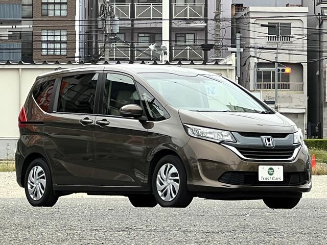 フリード G・ホンダセンシング /ワンオーナー車/ナビ/フルセグ/BT/AppleCarPlay/フリップダウンモニター/リヤカメラ/ETC/両側電動スライド/スマートキー/禁煙車/定員7名(3枚目)