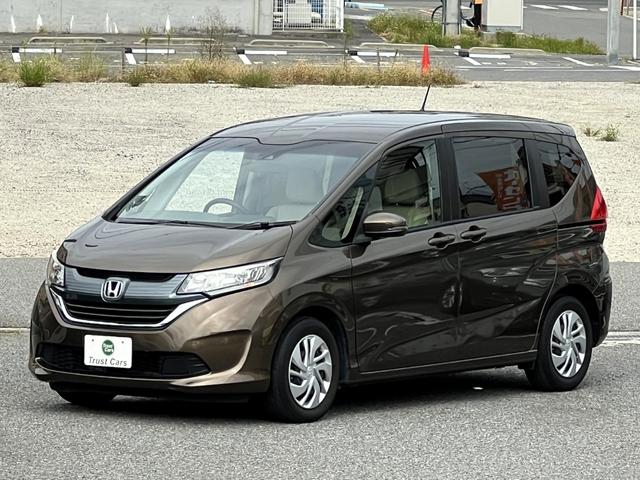 フリード G・ホンダセンシング /ワンオーナー車/ナビ/フルセグ/BT/AppleCarPlay/フリップダウンモニター/リヤカメラ/ETC/両側電動スライド/スマートキー/禁煙車/定員7名(7枚目)