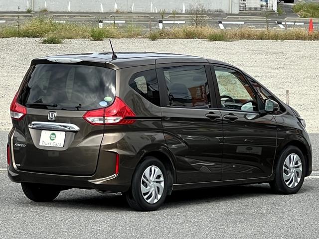 フリード G・ホンダセンシング /ワンオーナー車/ナビ/フルセグ/BT/AppleCarPlay/フリップダウンモニター/リヤカメラ/ETC/両側電動スライド/スマートキー/禁煙車/定員7名(9枚目)