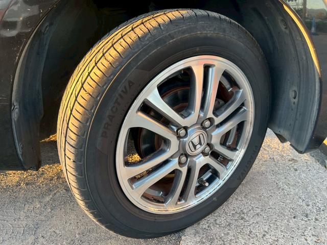 N-BOX G ターボSSパッケージ ワンオーナー ETC ナビ フルセグTV バックカメラ Bluetooth対応 スマートキー×2 両側電動パワースライドドア CBTA 純正14アルミホイール 取説・保証書・記録簿(51枚目)