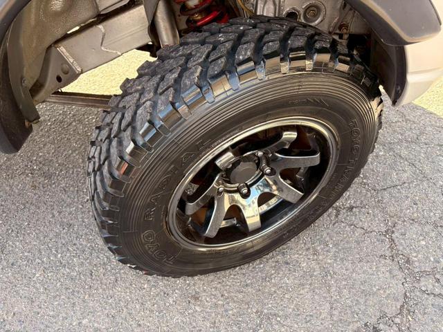 ジムニー XC 4WD 3型 ターボ オートマ リフトアップ ナビ TV Bluetooth対応 ETC リビルトエンジン載せ替え済み 足回り/タニグチSOLVE6606X-F ASSURAレーダー タイヤTOYO TRANPATH M/T深溝 キー×3本(57枚目)