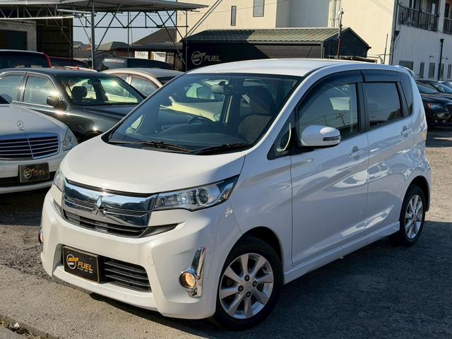 ｅＫカスタム Ｇ　４ＷＤ　ナビ　フルセグＴＶ　バックカメラ　Ｂｌｕｅｔｏｏｔｈ対応　スマートキー　純正アルミホイール（3枚目）