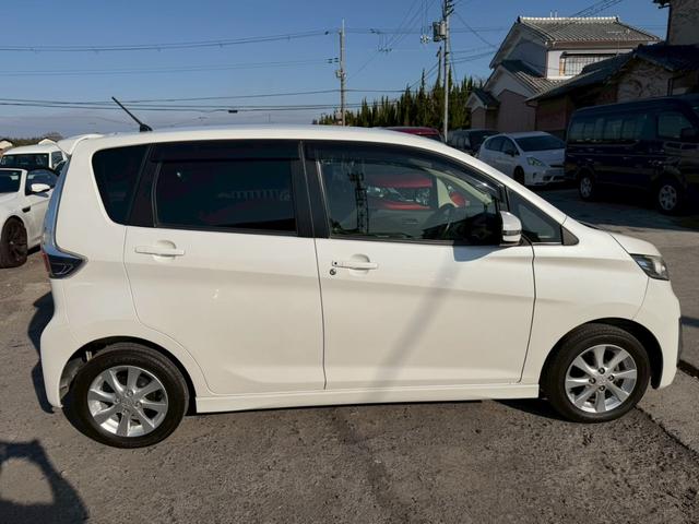 ｅＫカスタム Ｇ　４ＷＤ　ナビ　フルセグＴＶ　バックカメラ　Ｂｌｕｅｔｏｏｔｈ対応　スマートキー　純正アルミホイール（5枚目）