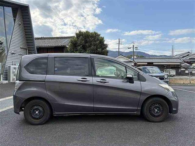 フリード G ジャストセレクション ユーザー買取・ディーラーオプションナビ・左側パワースライドドア・スマートキー・ETC(15枚目)