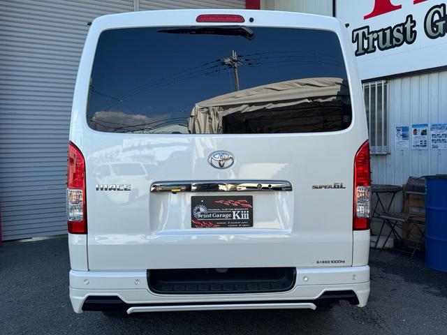 ハイエースバン スーパーGL ダークプライムII TRDフロントバンパーガード☆サイドステップ☆リアスポイラー☆マッドフラップ☆K3オリジナル16インチアルミ☆悪顔ボンネット☆ワイパーガード☆ナビTV・FDモニター☆360°カメラ☆ETC☆両側PS(9枚目)