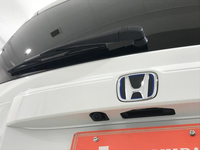 フリード ｅ：ＨＥＶエアー　ＥＸ　登録済未使用車　シートヒーター　アダプティブクルーズ　後席サーキュレーター　衝突軽減ブレーキ　両側電動スライドドア　６人乗り　純正アルミホイール　ホンダセンシング　ブラインドスポット（12枚目）