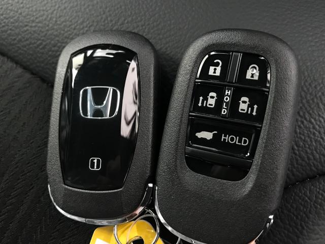 ステップワゴン スパーダ　登録済未使用車　シートヒーター　両側電動スライドドア　ＬＥＤライト　純正アルミホイール　衝突軽減ブレーキ　アダプティブクルーズコントロール　ブラインドスポットインフォメーション（37枚目）