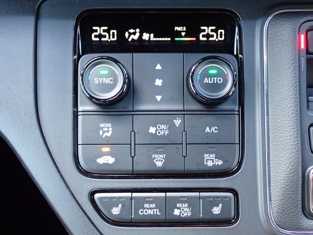 ステップワゴン ｅ：ＨＥＶスパーダ　純正ナビ　フルセグ　Ｒカメラ　ＥＴＣ　両側電動スライドドア　ドライブレコーダー前　電子パーキング　オットマン　シートバックテーブル　障害物センサー　サンシェード　ＴＶジャック　ホンダコネクト（30枚目）