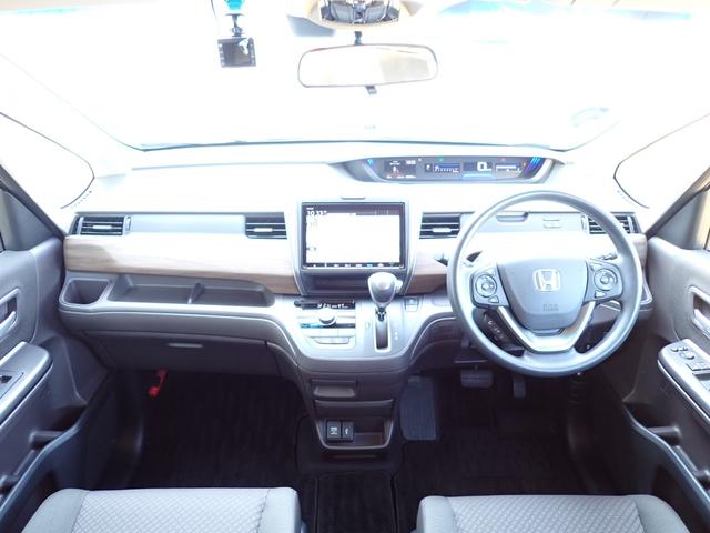 フリード Ｇ　当社元レンタカー　禁煙　６人乗　９インチ純正ナビ　両側電動スライド　前ドラレコ　ＥＴＣ　Ｒカメラ　　誤発進抑制機能　衝突軽減ブレーキ　シートヒーター　オートリトラミラー　ＵＳＢ　ＢＴ　ＤＶＤ　ＣＤ録音（6枚目）