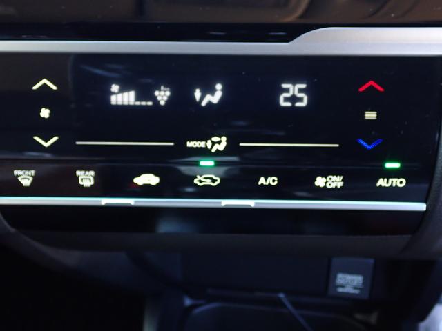 フィット １３Ｇ・Ｆコンフォートエディション　１オーナー　禁煙　７インチ純正ナビ　Ｒカメラ　ＥＴＣ　シートヒーター　オートリトラミラー　衝突軽減ブレーキ　プライバシーガラス　フルセグ　ＤＶＤ再生　ＢＴ　アームレスト　スマートキー　サイドエアバッグ（9枚目）