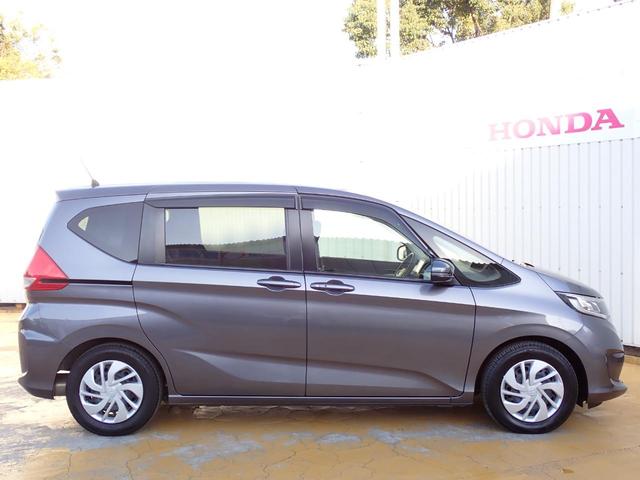 フリード Ｇ・ホンダセンシング　６人乗り　禁煙　７インチ純正ナビ　用品フロントグリル　前後ドラレコ　ＴＶキット　両側電動スライドドア　Ｒカメラ　ＥＴＣ　フルセグ　ＤＶＤ　ＢＴ　衝突軽減ブレーキ　誤発進抑制　ハロゲンヘッドライト（18枚目）