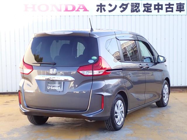 フリード Ｇ・ホンダセンシング　６人乗り　禁煙　７インチ純正ナビ　用品フロントグリル　前後ドラレコ　ＴＶキット　両側電動スライドドア　Ｒカメラ　ＥＴＣ　フルセグ　ＤＶＤ　ＢＴ　衝突軽減ブレーキ　誤発進抑制　ハロゲンヘッドライト（19枚目）