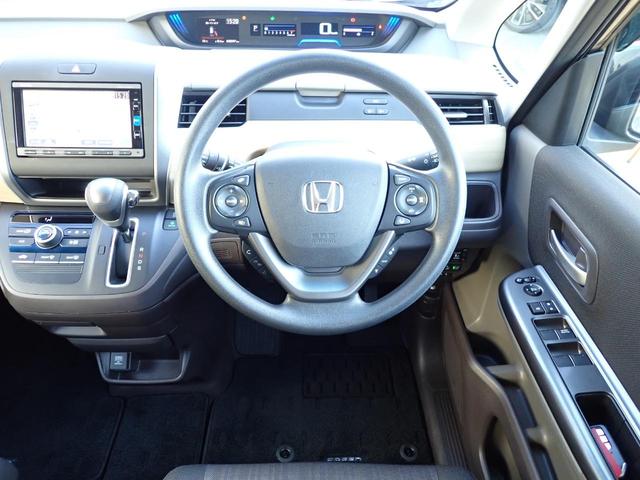 フリード Ｇ・ホンダセンシング　６人乗り　禁煙　７インチ純正ナビ　用品フロントグリル　前後ドラレコ　ＴＶキット　両側電動スライドドア　Ｒカメラ　ＥＴＣ　フルセグ　ＤＶＤ　ＢＴ　衝突軽減ブレーキ　誤発進抑制　ハロゲンヘッドライト（29枚目）