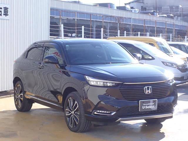 ヴェゼル ｅ：ＨＥＶＺ　１オーナー　禁煙　メーカー純正９インチナビ　フォグライト・サイドステップガーニッシュ　テールゲートスポイラー　ドアハンドルカバー　前後ドラレコ　ＴＶキット　エキパイフィニッシャー　ブラインドスポット（18枚目）