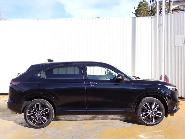 ヴェゼル ｅ：ＨＥＶＺ　１オーナー　禁煙　メーカー純正９インチナビ　フォグライト・サイドステップガーニッシュ　テールゲートスポイラー　ドアハンドルカバー　前後ドラレコ　ＴＶキット　エキパイフィニッシャー　ブラインドスポット（19枚目）