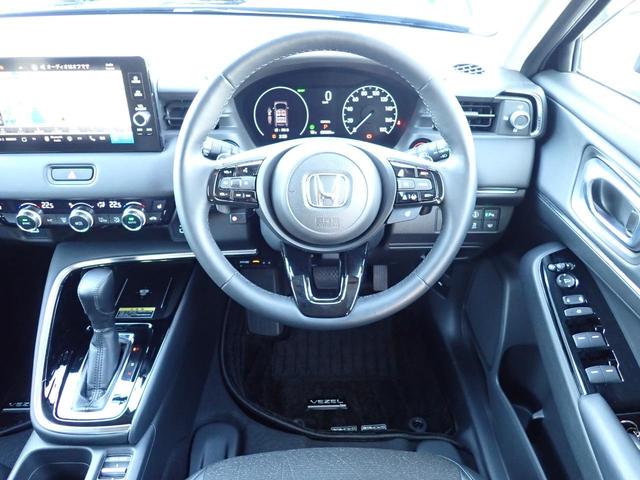 ヴェゼル ｅ：ＨＥＶＺ　１オーナー　禁煙　メーカー純正９インチナビ　フォグライト・サイドステップガーニッシュ　テールゲートスポイラー　ドアハンドルカバー　前後ドラレコ　ＴＶキット　エキパイフィニッシャー　ブラインドスポット（30枚目）