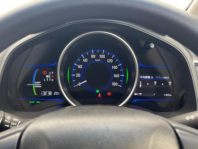 フィットハイブリッド Fパッケージ 禁煙車 純正SDナビ バックカメラ ドラレコ スマートキー ETC オートエアコン 横滑り防止装置 運転席アームレスト 電動格納ミラー シートリフター プライバシーガラス CD(28枚目)