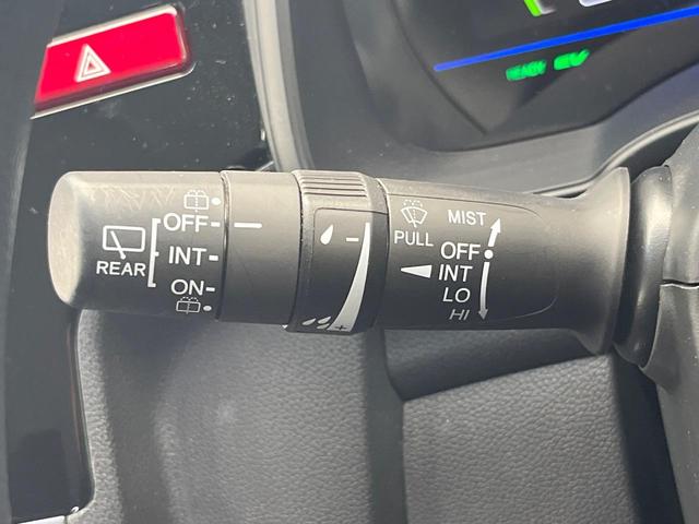 フィットハイブリッド Fパッケージ 禁煙車 純正SDナビ バックカメラ ドラレコ スマートキー ETC オートエアコン 横滑り防止装置 運転席アームレスト 電動格納ミラー シートリフター プライバシーガラス CD(50枚目)