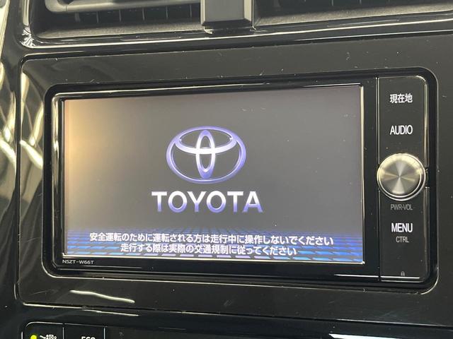 プリウス E トヨタセーフティセンス 純正SDナビ バックカメラ レーダークルーズ ETC Bluetooth スマートキー LEDヘッドライト ステアリングスイッチ 盗難防止装置 横滑防止装置 オートライト(3枚目)