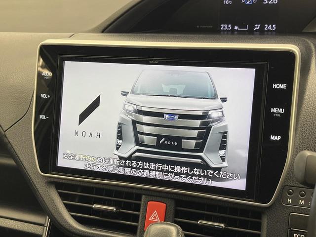 ノア Ｇ　両側電動ドア　後席モニター　バックカメラ　衝突被害軽減システム　ドラレコ　コーナーセンサー　スマートキー　ＬＥＤヘッド　ナビ連動ＥＴＣ　クルコン　純正１５インチアルミ　オートハイビーム　車線逸脱警報（3枚目）