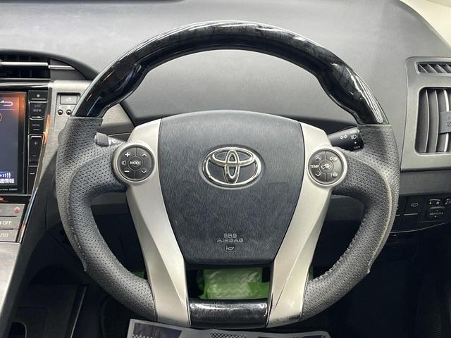 プリウス Ｓツーリングセレクション　モデリスタエアロ　９インチＳＤナビ　バックカメラ　ＥＴＣ　Ｂｌｕｅｔｏｏｔｈ　　スマートキー　ＬＥＤヘッドライト　革巻きステアリング　ステアリングスイッチ　オートライト　オートエアコン　盗難防止装置（11枚目）