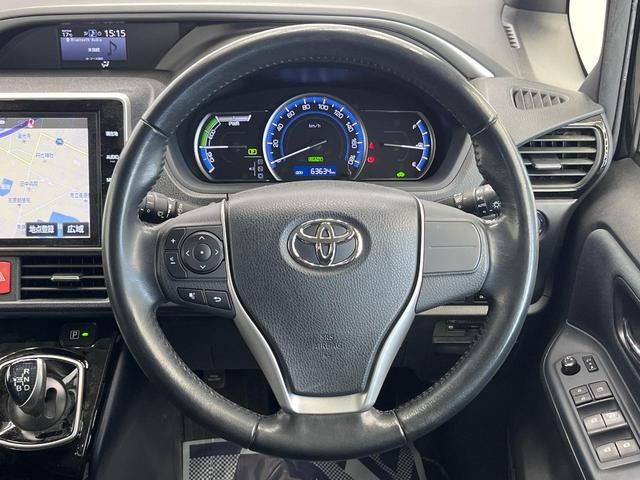 ヴォクシー ハイブリッドＺＳ　煌ＩＩ　１０型ＳＤナビ　後席モニター　バックカメラ　衝突被害軽減システム　両側自動ドア　禁煙車　ドラレコ　スマートキー　ＬＥＤヘッド　ビルトインＥＴＣ　純正１６インチアルミ　オートハイビーム　デュアルエアコン（12枚目）