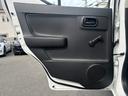 Ｆ　車検Ｒ９年１１月／キーレス／横滑り防止装置／タイヤパンク修理キット／前席電動パワーウィンドウ／ＣＤ再生／ＭＴモード付き／取り扱い説明書／点検記録簿／（42枚目）