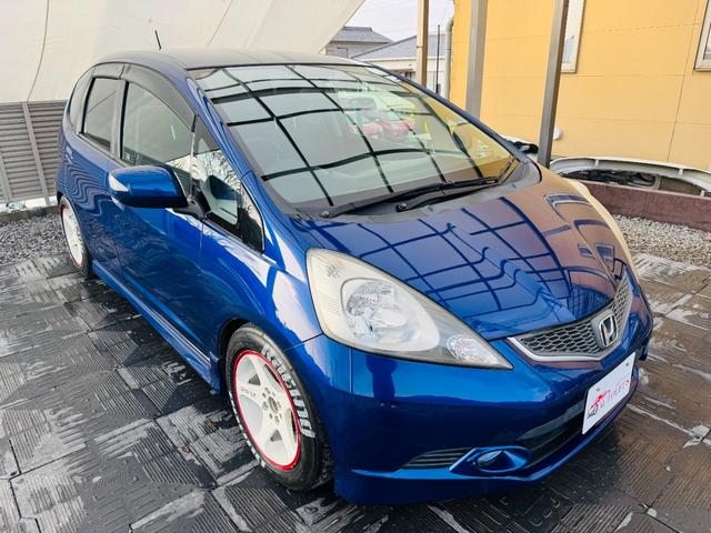 フィット RS 5速MT・CUSCO車高調・OMPステアリング・TRUSTマフラー・WORK15インチAW・外品ナビ・TV・オートライト・HID・キーレス・Fフォグ・電格ミラー(38枚目)