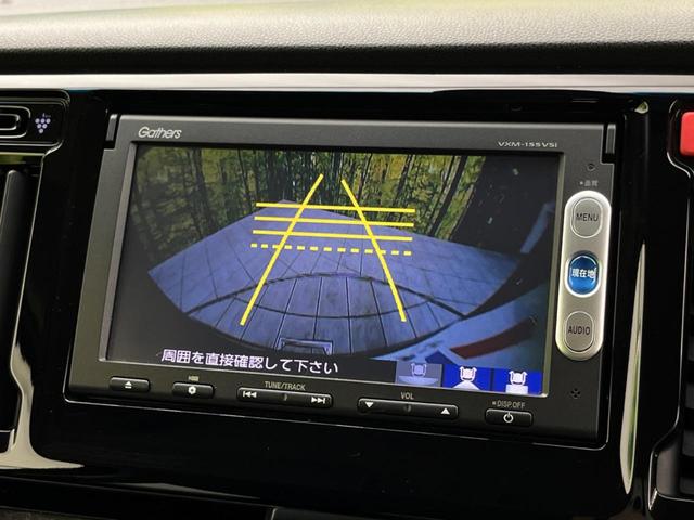 Ｇ・Ａパッケージ　禁煙車　衝突軽減ブレーキ　純正ナビ　バックカメラ　クルーズコントロール　スマートキー　オートエアコン　ＨＩＤヘッドライト　純正１４インチアルミ　ハーフレザーシート　オートライト　ＥＴＣ(5枚目)