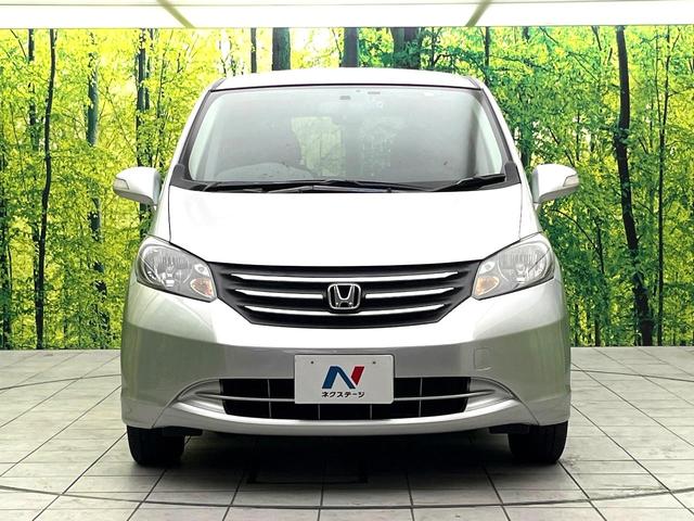 フリード Ｇ　ジャストセレクション　純正ナビ　フリップダウンモニター　バックカメラ　禁煙車　両側電動スライドドア　ドラレコ　ＥＴＣ　ＨＩＤヘッドライト　純正１４インチホイール　オートライト　電動格納ミラー　オートエアコン　スマートキー（16枚目）