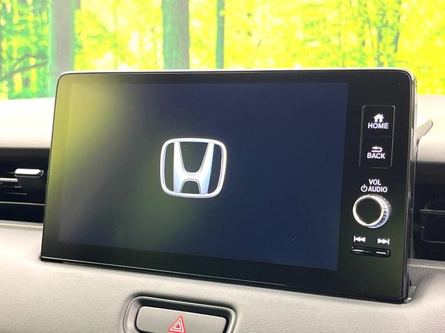 ヴェゼル ｅ：ＨＥＶ　Ｚ　登録済未使用車　純正７インチナビ　バックカメラ　アダプティブクルーズコントロール　ＬＥＤヘッドライト　純正１８インチアルミ　ハーフレザーシート　パワーバックドア　コーナーセンサー　ＥＴＣ（4枚目）