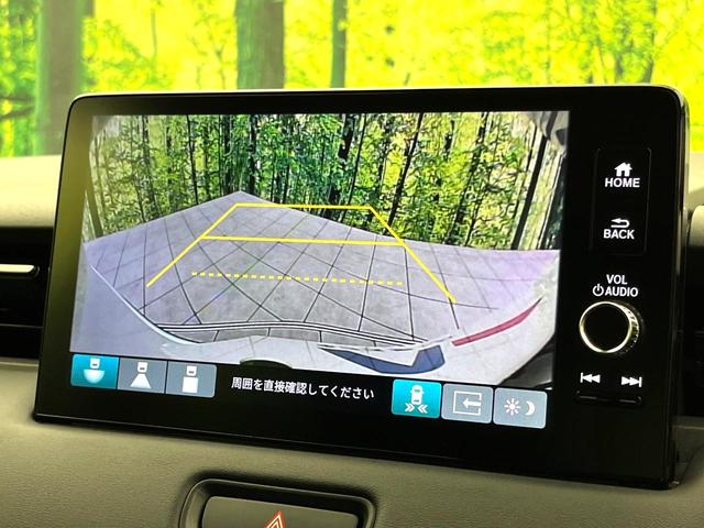 ヴェゼル ｅ：ＨＥＶ　Ｚ　登録済未使用車　純正７インチナビ　バックカメラ　アダプティブクルーズコントロール　ＬＥＤヘッドライト　純正１８インチアルミ　ハーフレザーシート　パワーバックドア　コーナーセンサー　ＥＴＣ（5枚目）